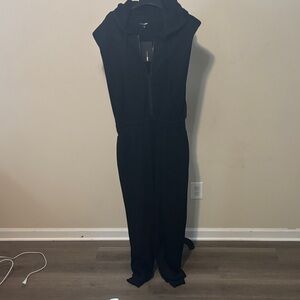 Fashion Nova “Isabelle” shoulder pad hooded jumpsuit